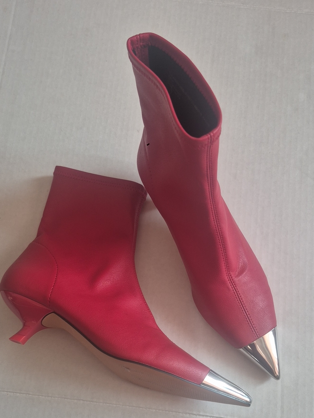 Katy Perry Red stretch ankle Boots with silver toe.